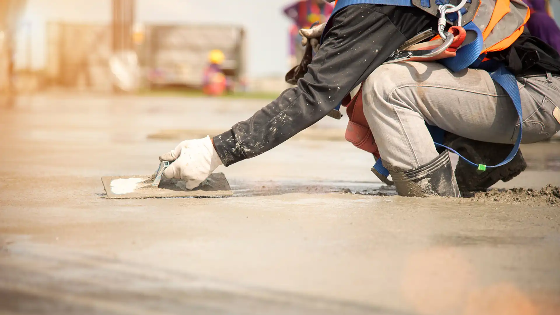 Can concrete be poured in the rain – person laying concrete