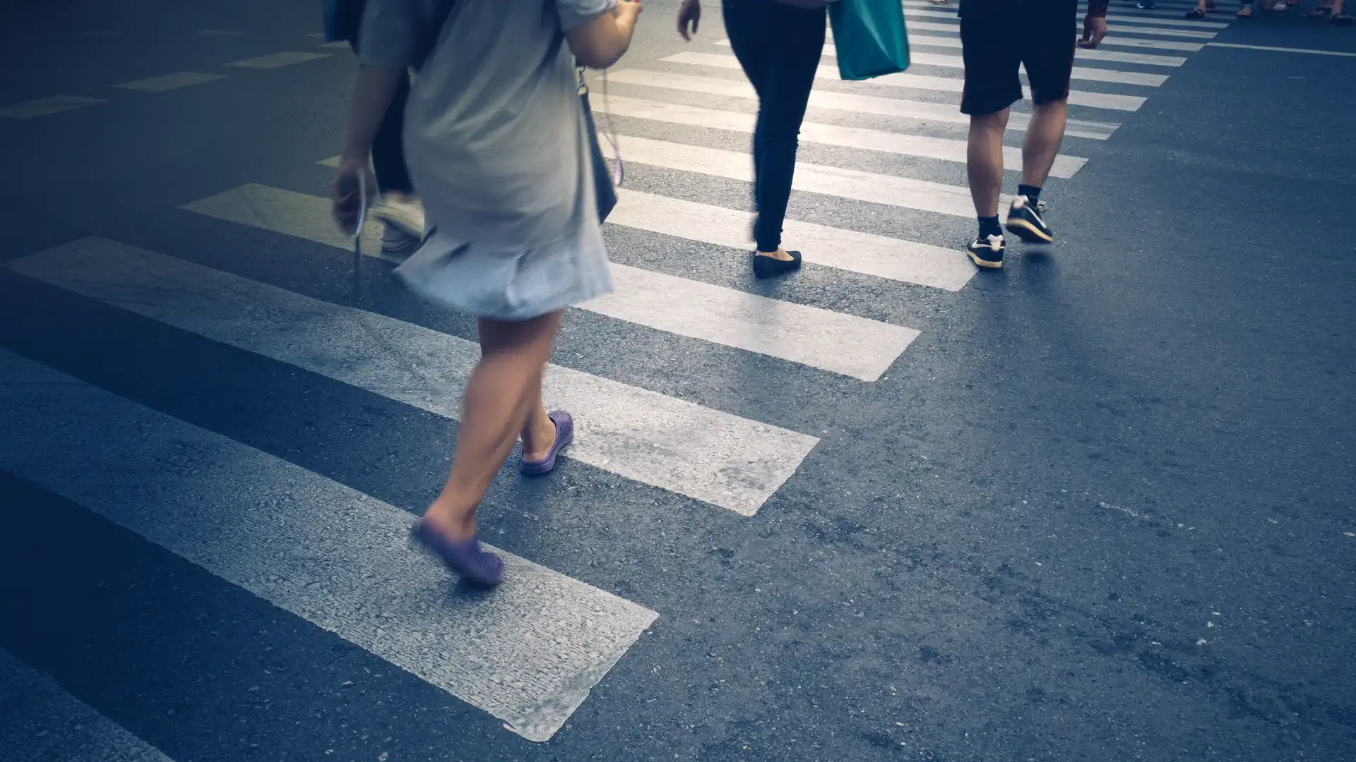 Pedestrian safety – People walking across a pedestrian crossing